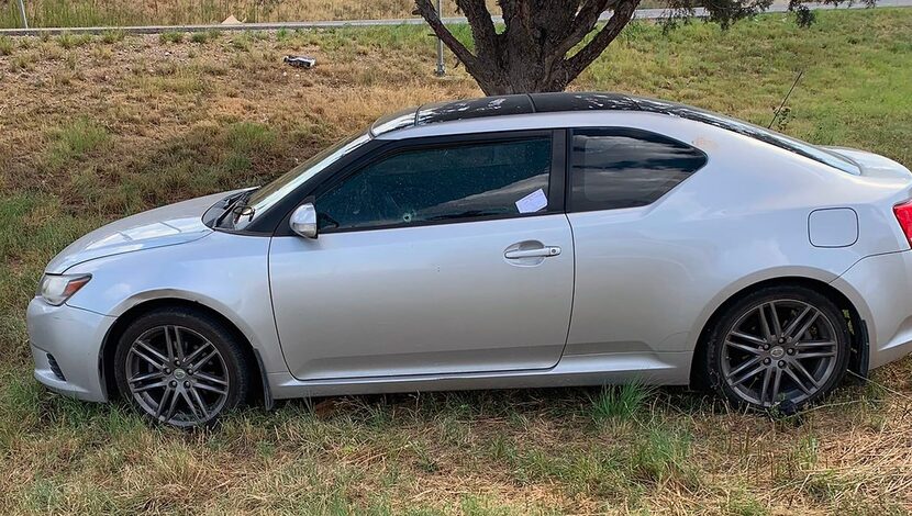 An image, courtesy of Ernst Villanueva and taken Saturday, shows a car with a bullet hole in...