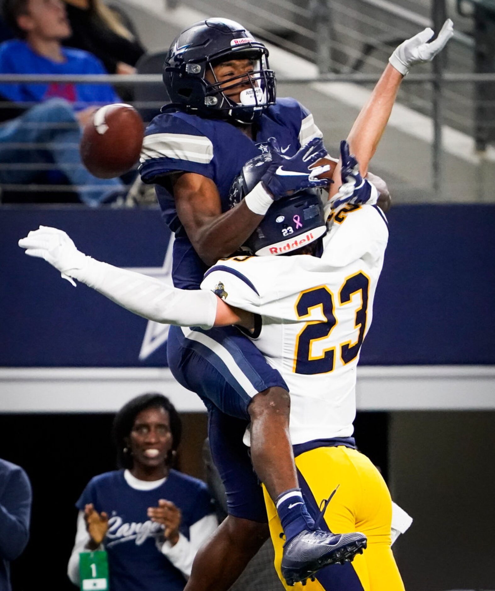 Highland Park defensive back Andrew Bonnet (23) commits a pass interference call on a pass...