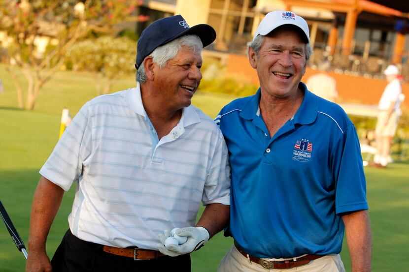 Lee Trevino and George W. Bush exchange a laugh prior to The Bush Center Warrior Open golf...