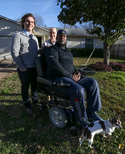 Will Toler (left) helped Vicki and Mark Booker with tax issues for their Hamilton Park home.