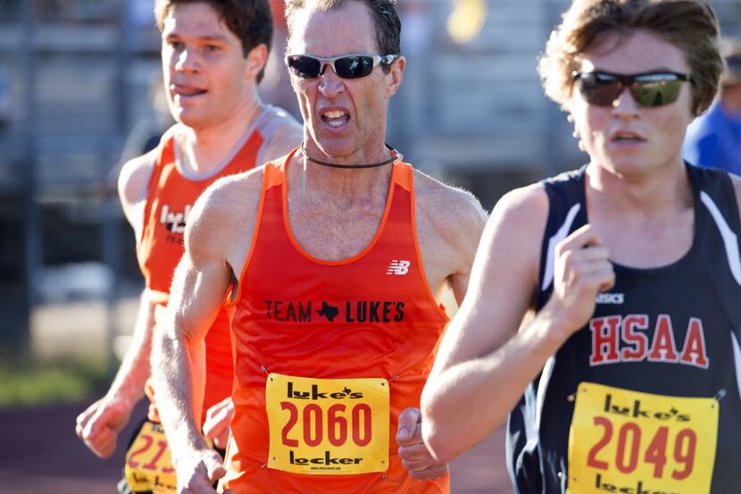 Former Dallas White Rock Marathon winner William Moore, 54, runs the 1 mile race in the...