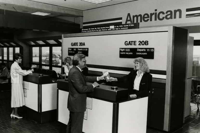 American Airlines employees greet passengers at DFW International Airport in 1981.