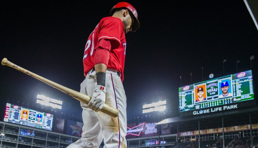 Texas Rangers center fielder Ian Desmond (20) walks to the dugout after a 3-1 loss to the...