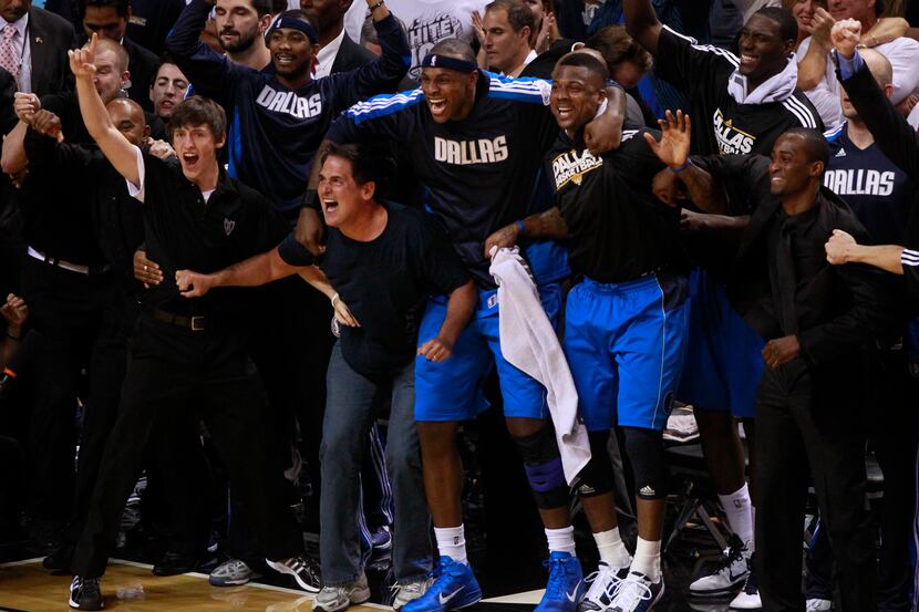Owner Mark Cuban and the Mavericks can't contain their joy as the final seconds tick off the...