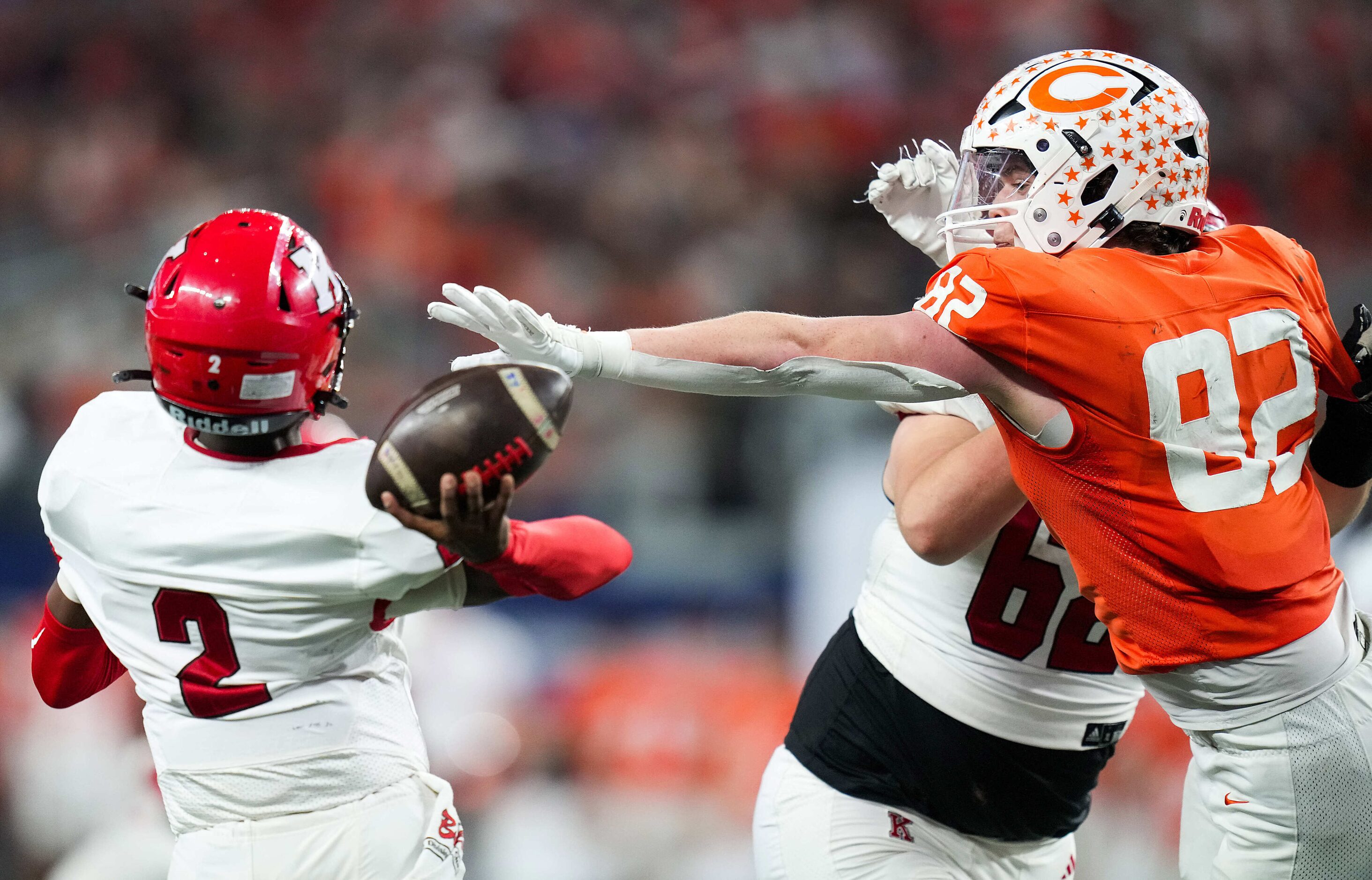 Kilgore's Kayson Brooks (2) throws an interception under pressure from Celina's Andrew...