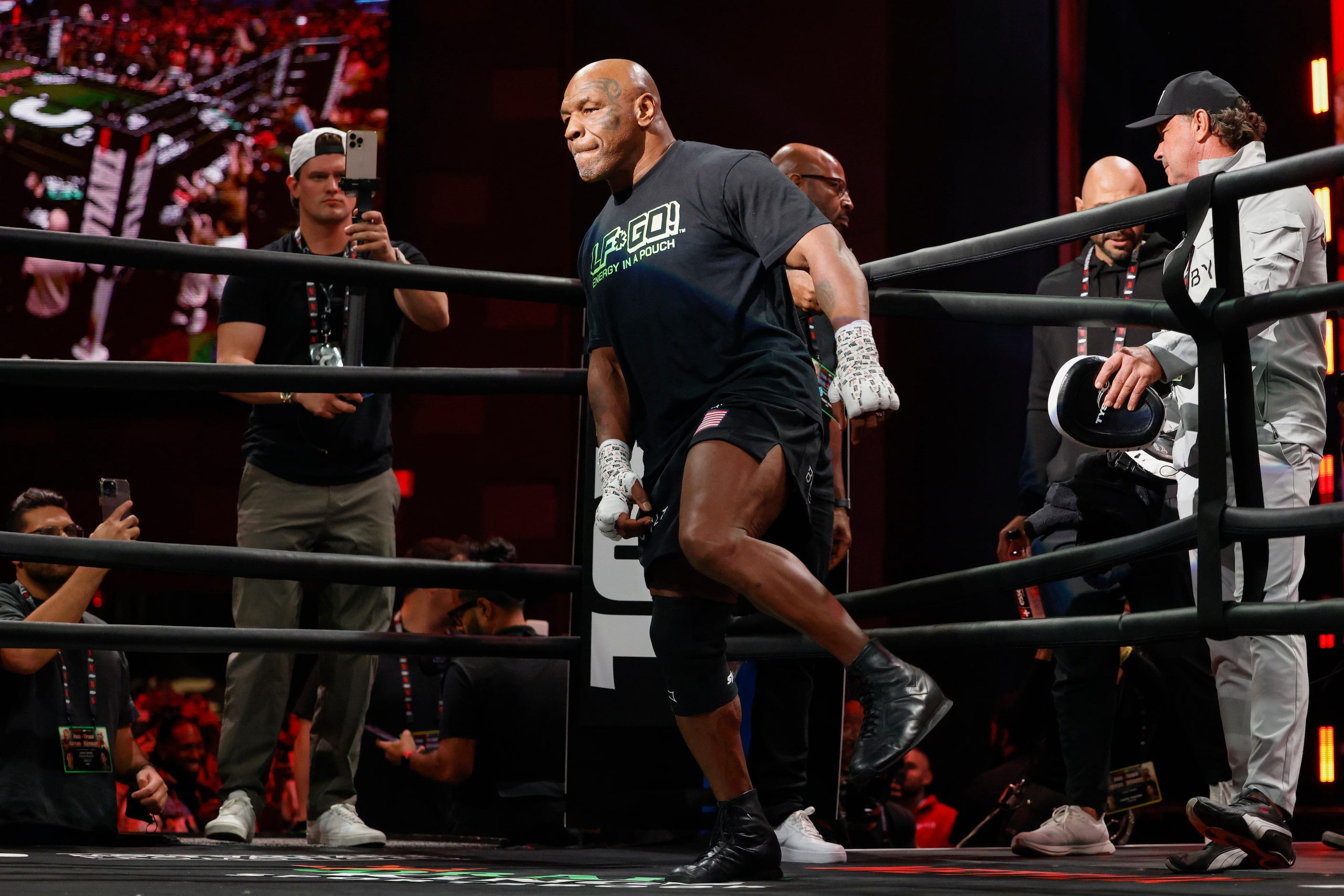 Mike Tyson steps into the ring for an open workout ahead of his upcoming boxing bout against...