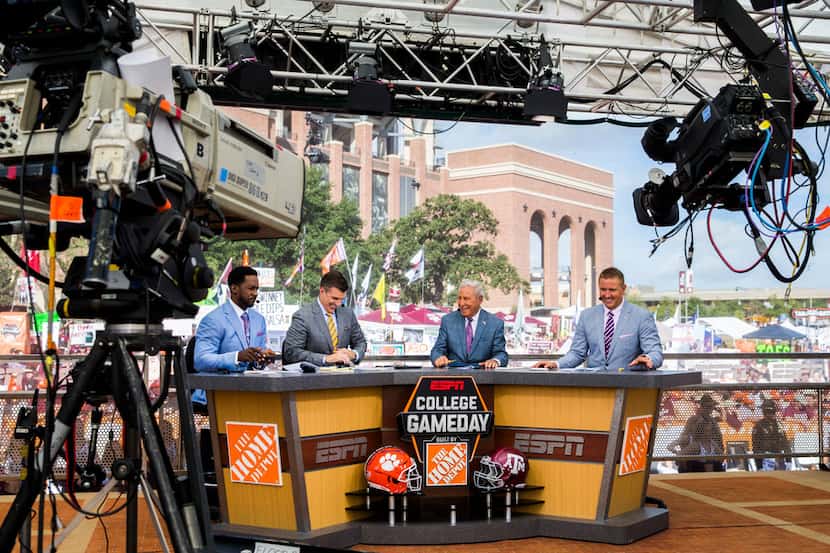 The ESPN College GameDay crew laughs during a broadcast before the Texas A&M Aggies took on...