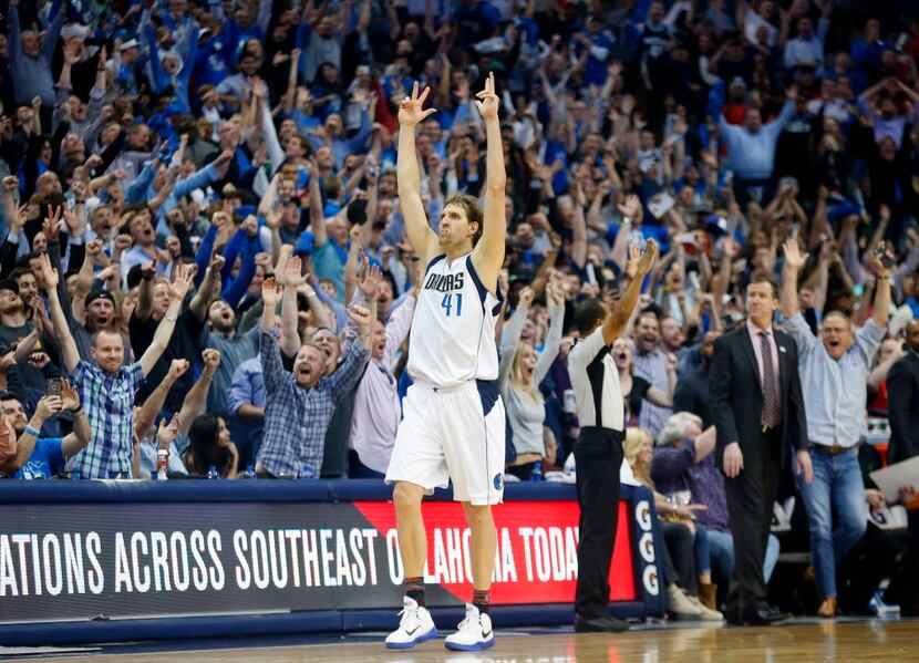 Dallas Mavericks forward Dirk Nowitzki (41) reacts after scoring a late three-pointer to put...