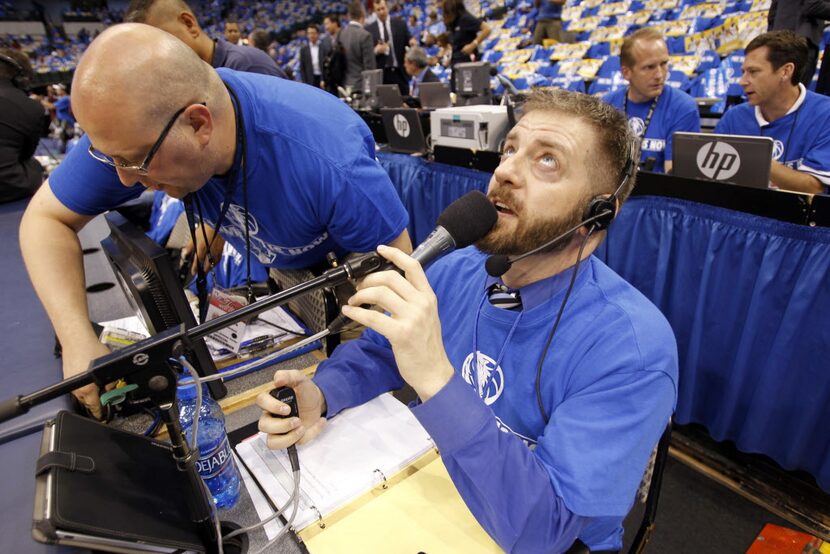 In this file photo, Dallas Mavericks announcer Sean Heath gets ready for Game 3 of the NBA...