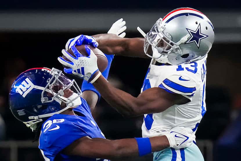 Dallas Cowboys wide receiver Michael Gallup (13) catches a 29-yard pass over New York Giants...