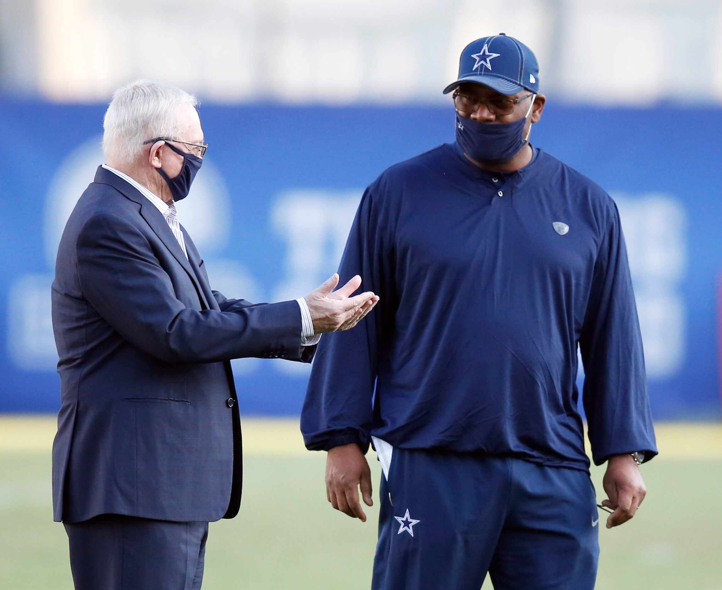 Dallas Cowboys owner and general manager Jerry Jones talks to Dallas Cowboys assistant head...
