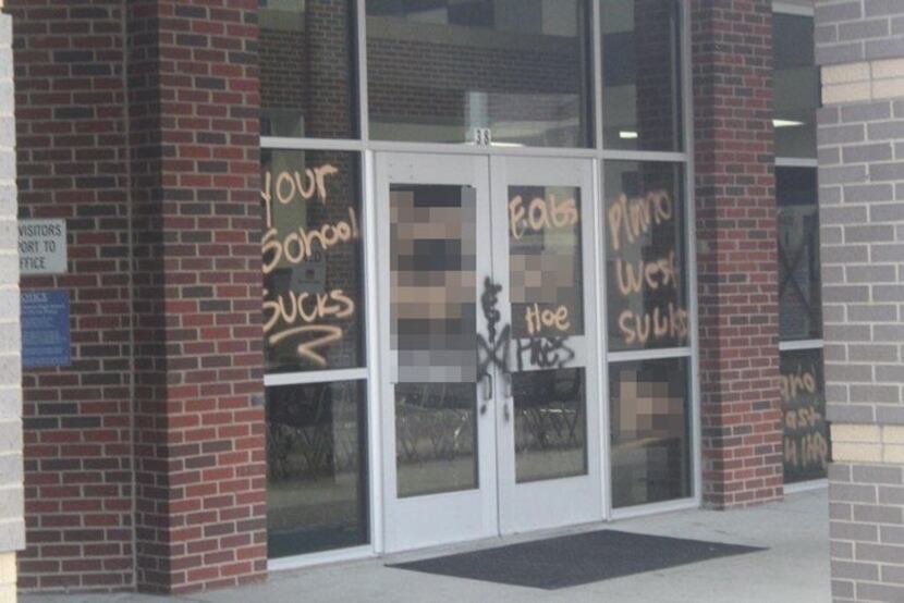 Pictures show graffiti sprayed on the outside walls and windows of Plano West Senior High...