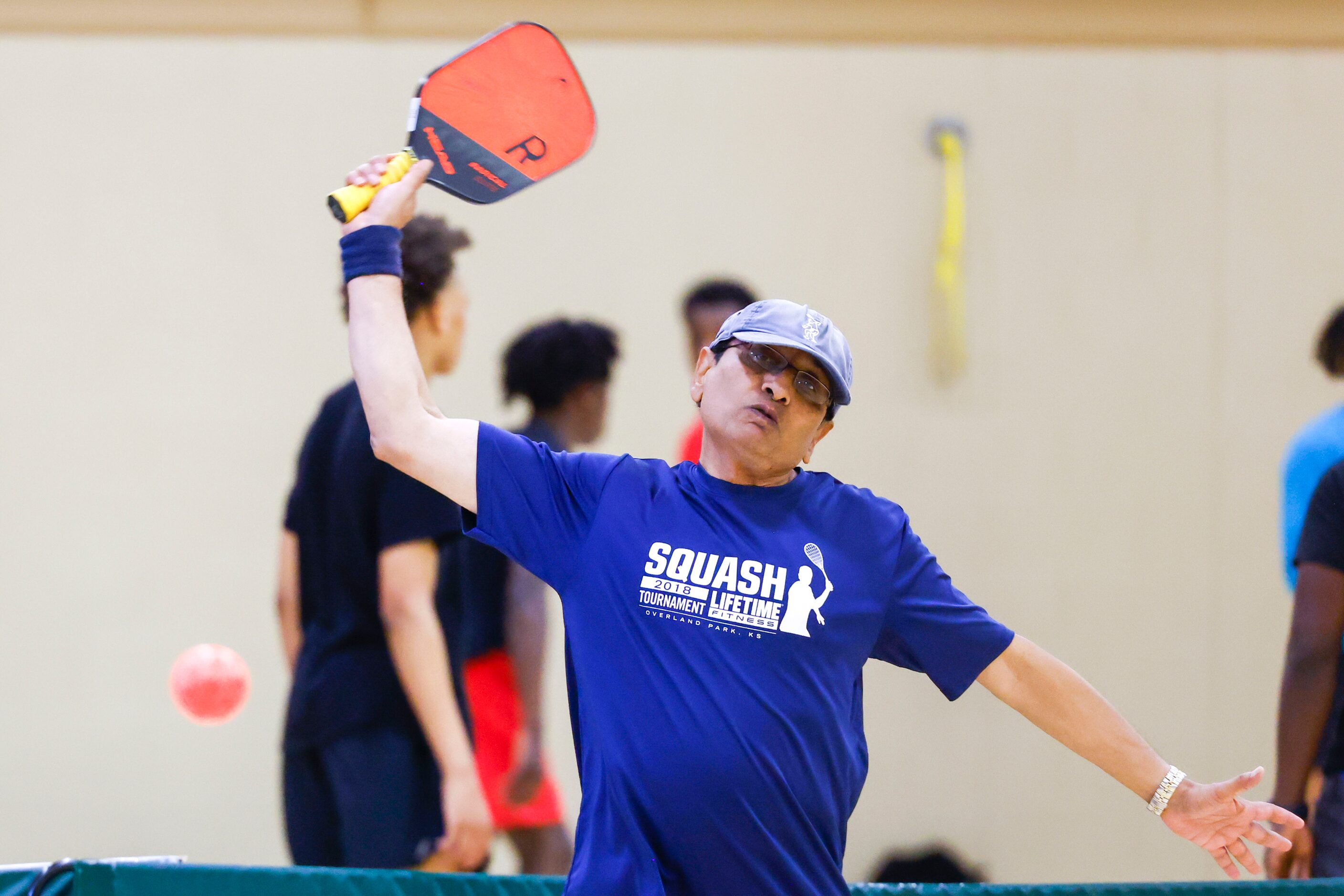 Abhi Biswas of Plano hits during a pickle ball game on Friday, May 26, 2023 at Tom...