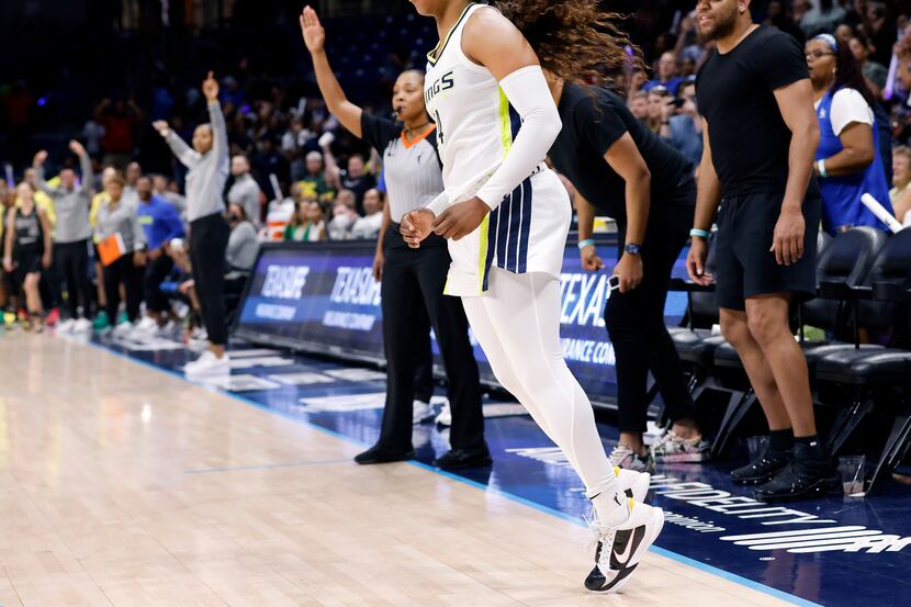 Dallas Wings guard Arike Ogunbowale (24) reacts after her last second shot didn’t fall...