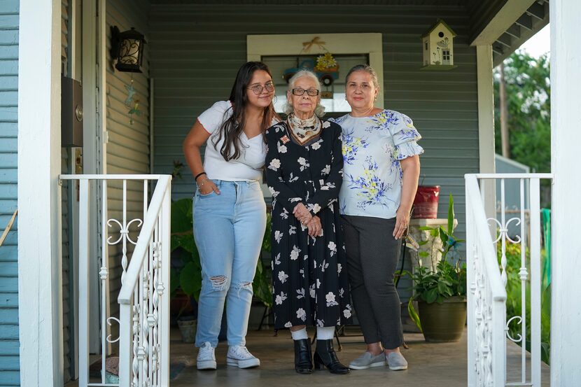 Alejandra Vila, 57, (right) photographed with her mother Olga Umana, 89, (center) and...