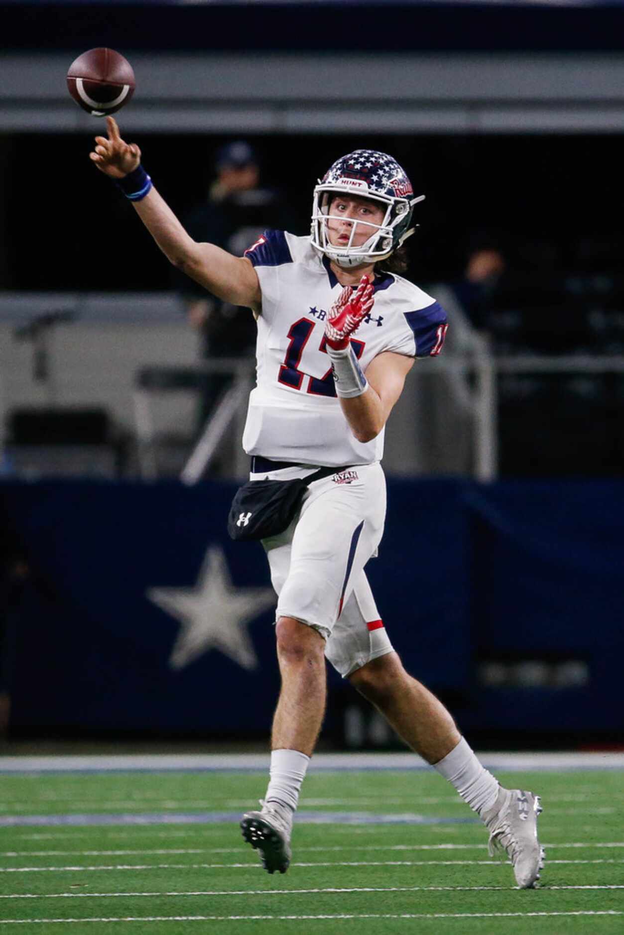 Denton Ryan's quarterback Seth Henigan (17) throws the ball in the first quarter of a Class...