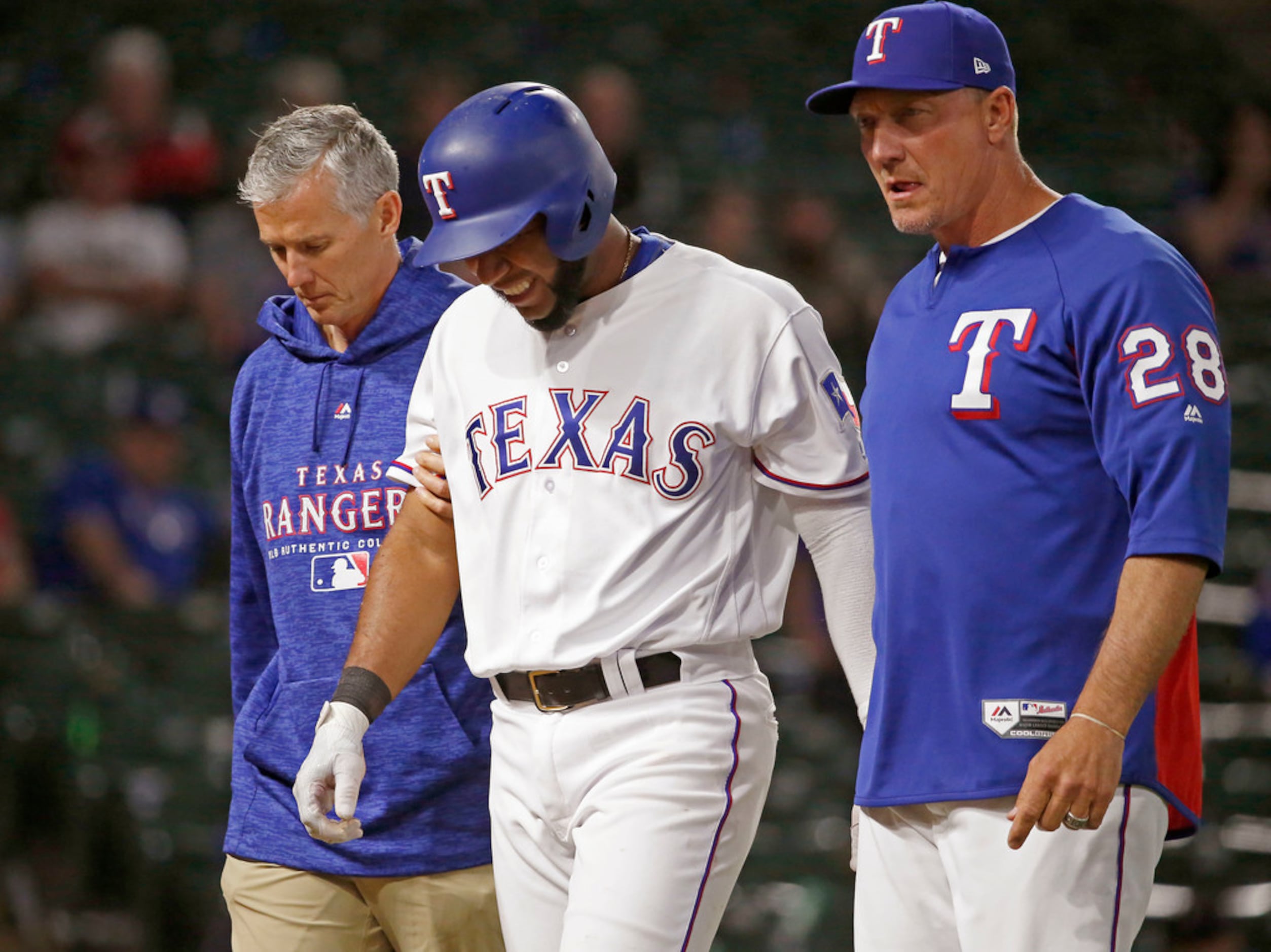 Rangers' Elvis Andrus breaks elbow after getting hit