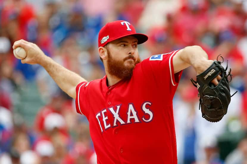 Texas Rangers relief pitcher Sam Dyson throws a pitch against Toronto Blue Jays during the...
