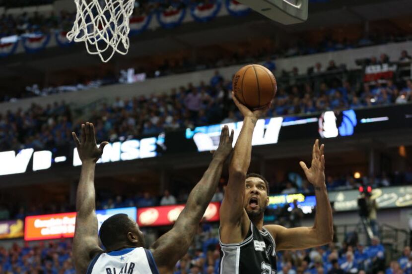 Apr 28, 2014; Dallas, TX, USA; San Antonio Spurs forward Tim Duncan (21) shoots against...