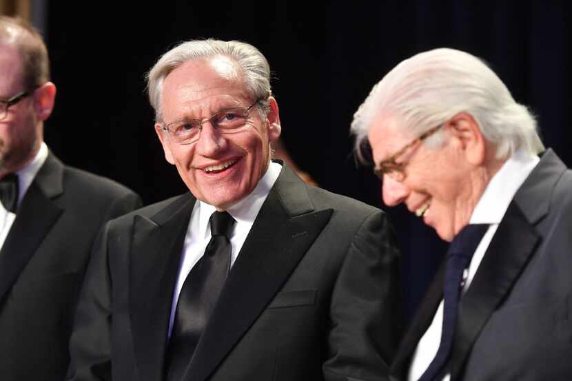 Bob Woodward, center, and Carl Bernstein, right, chat during the White House Correspondents...