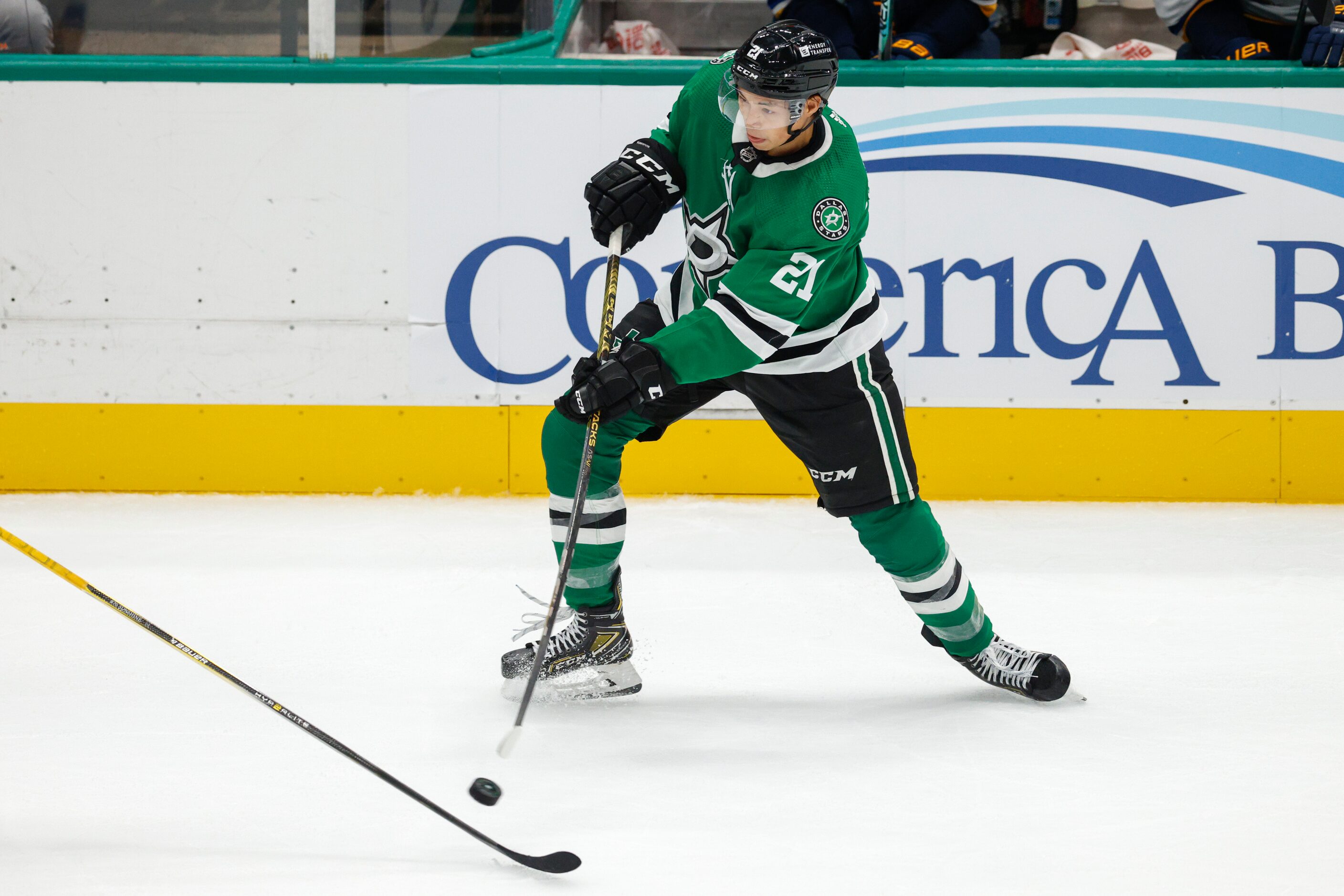 Dallas Stars left wing Jason Robertson (21) passes the puck during the third period of the...