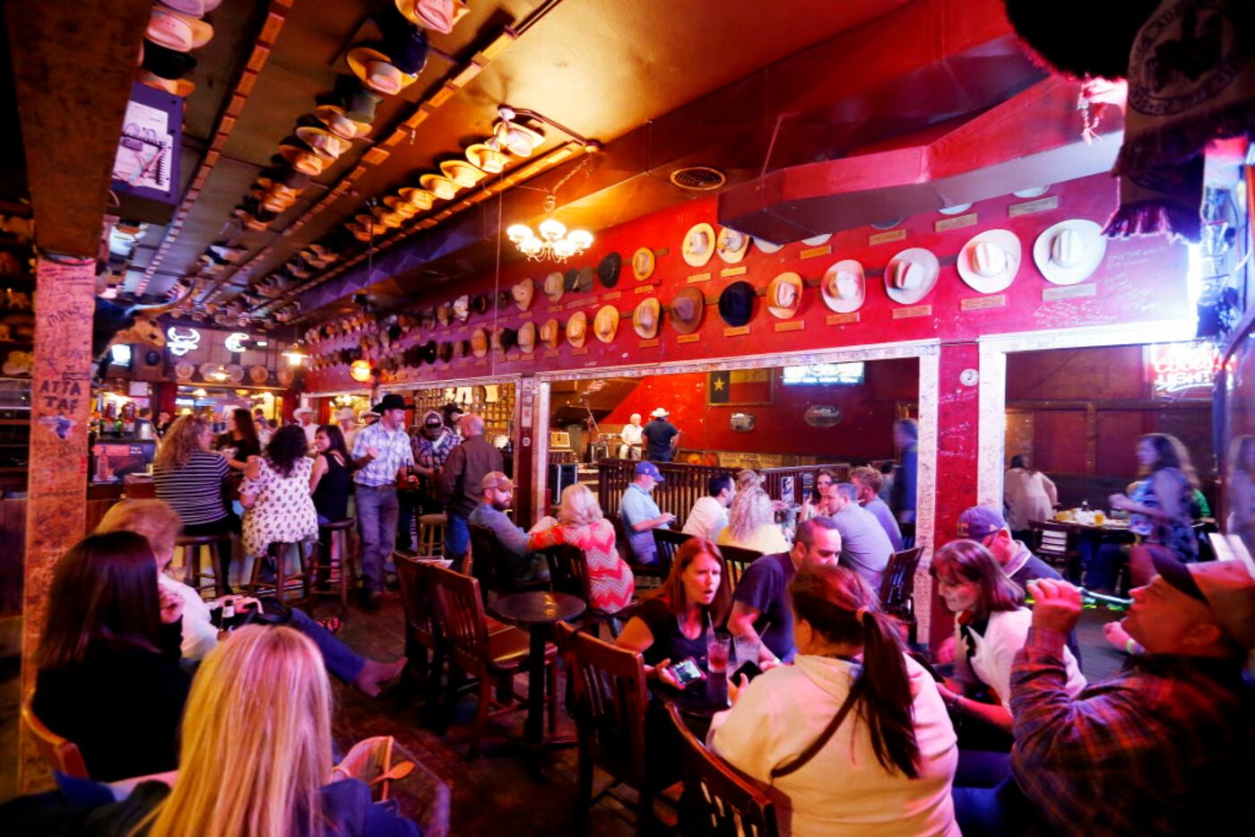 At the White Elephant Saloon in the Fort Worth Stockyards, the walls are covered with music...