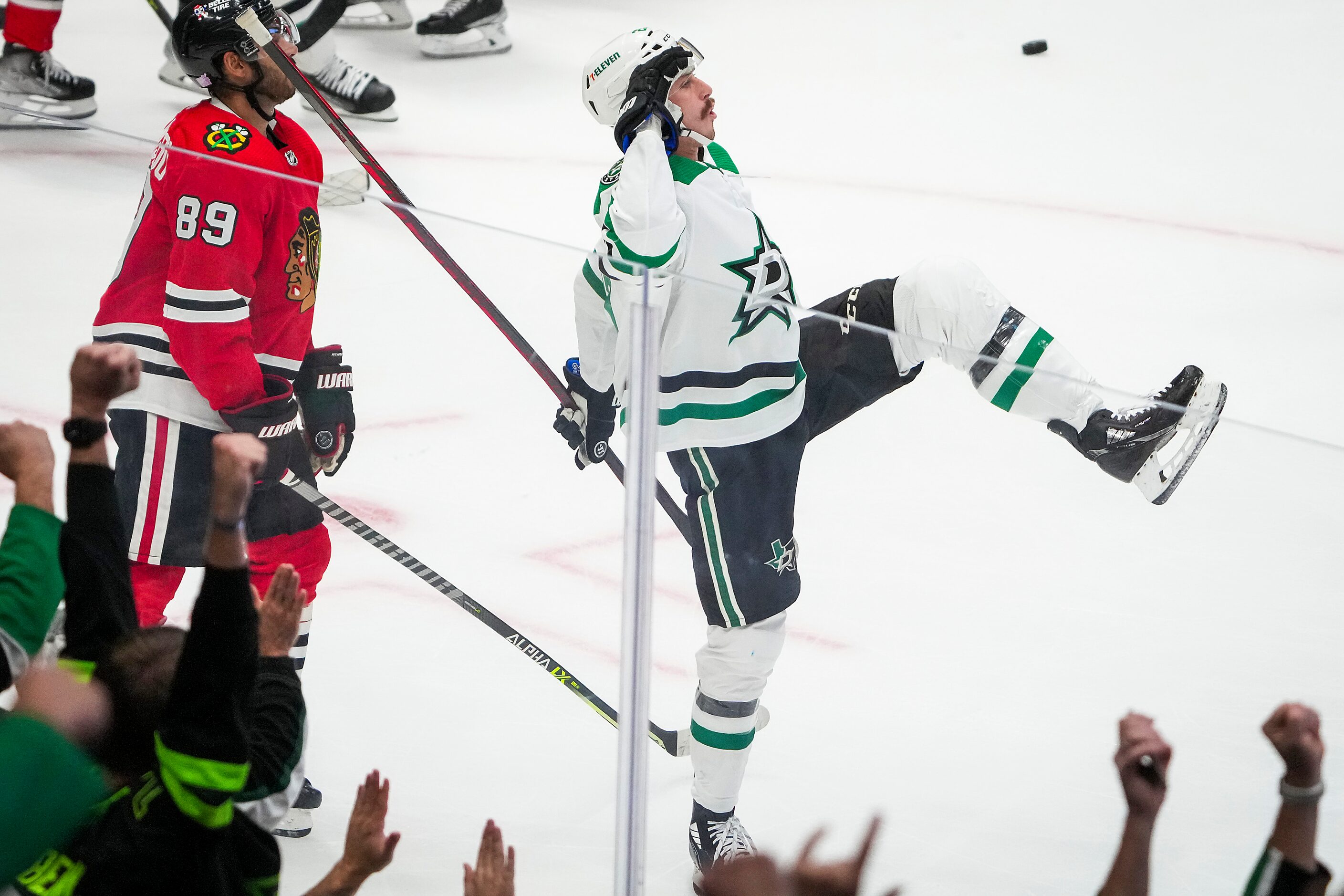 Dallas Stars left wing Mason Marchment (27) celebrates past Chicago Blackhawks center...