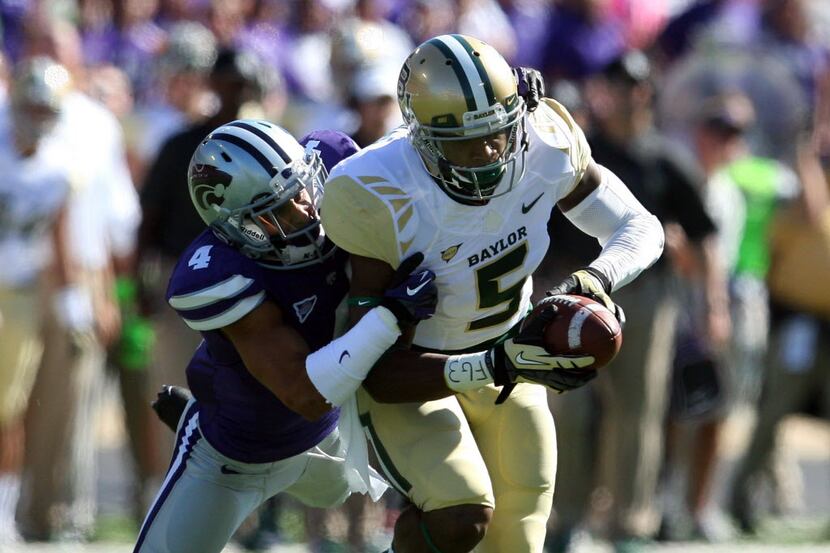 Baylor Bears wide receiver Antwan Goodley (5) is tackled by Kansas State Wildcats defensive...