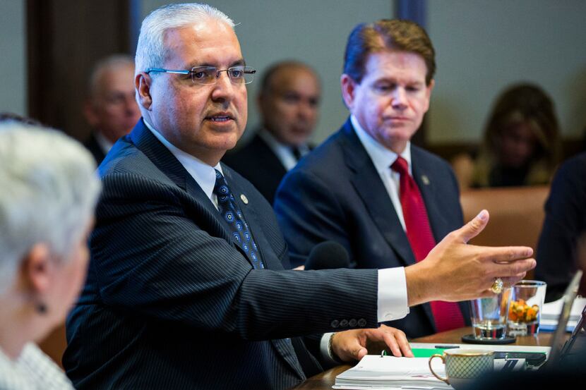 Arlington ISD Superintendent Marcelo Cavazos (center) is seen in this file photo.