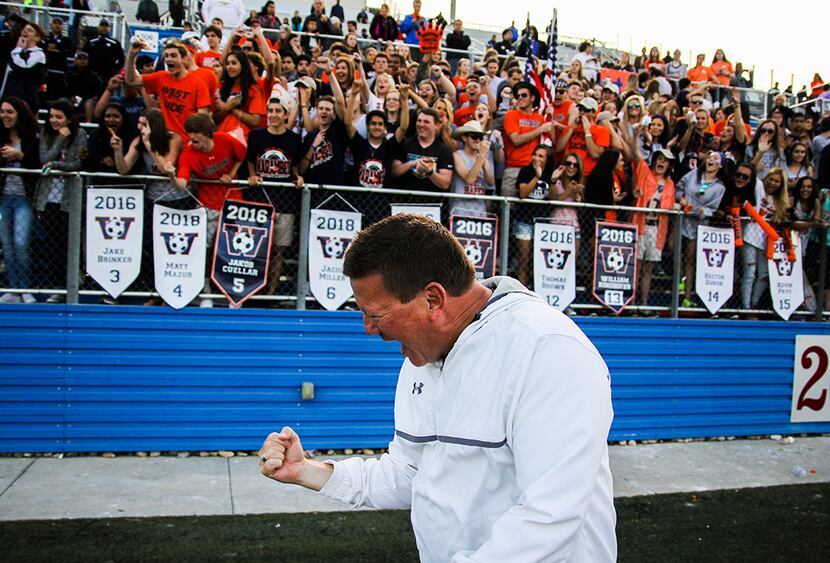  Coach Rusty Ogelsby celebrates after the Wakeland Wolverines beat Pflugerville Connally 4-0...