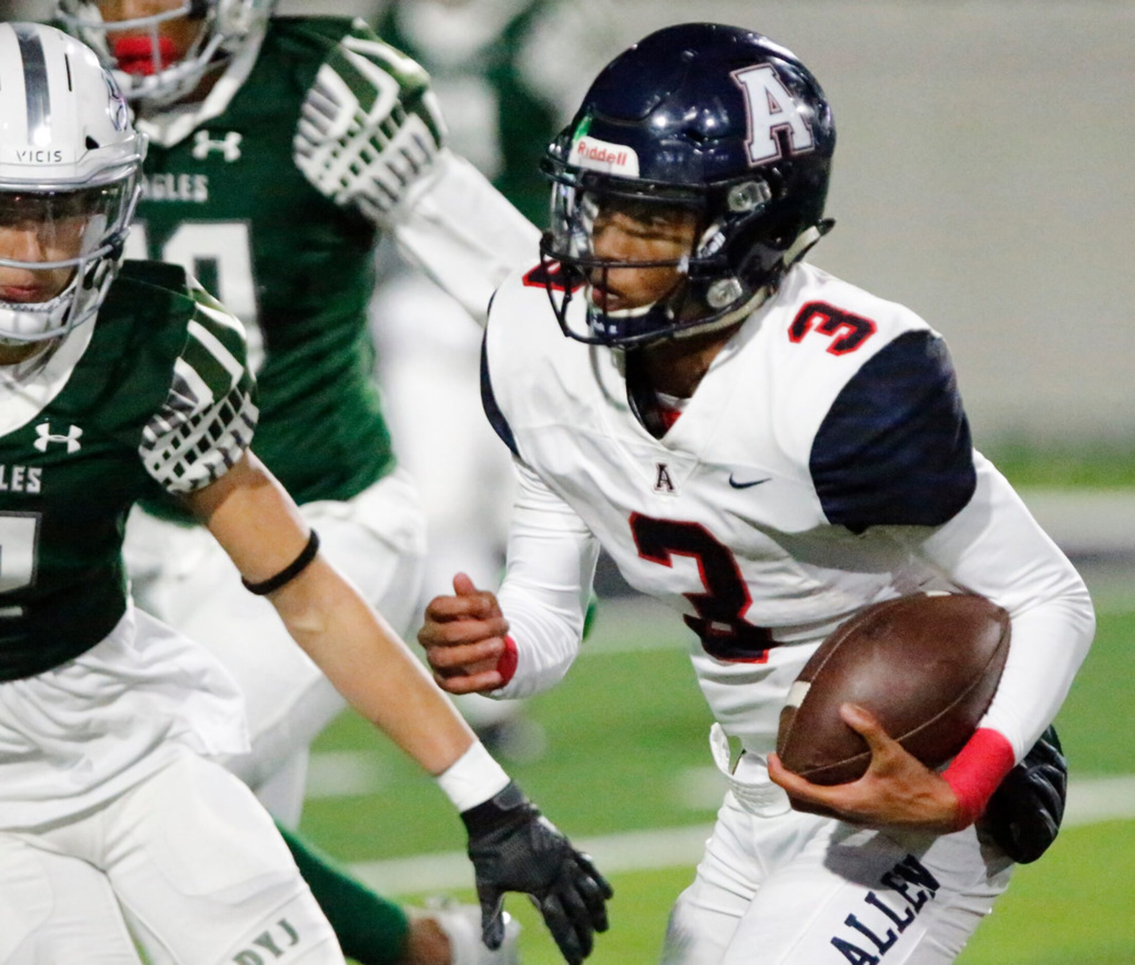 Allen High School quarterback Raylen Sharpe (3) carries the ball for a touchdown during the...