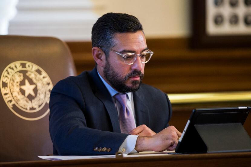 Representative Cesar Blanco sits at his desk on the second day of the 86th Texas legislature...