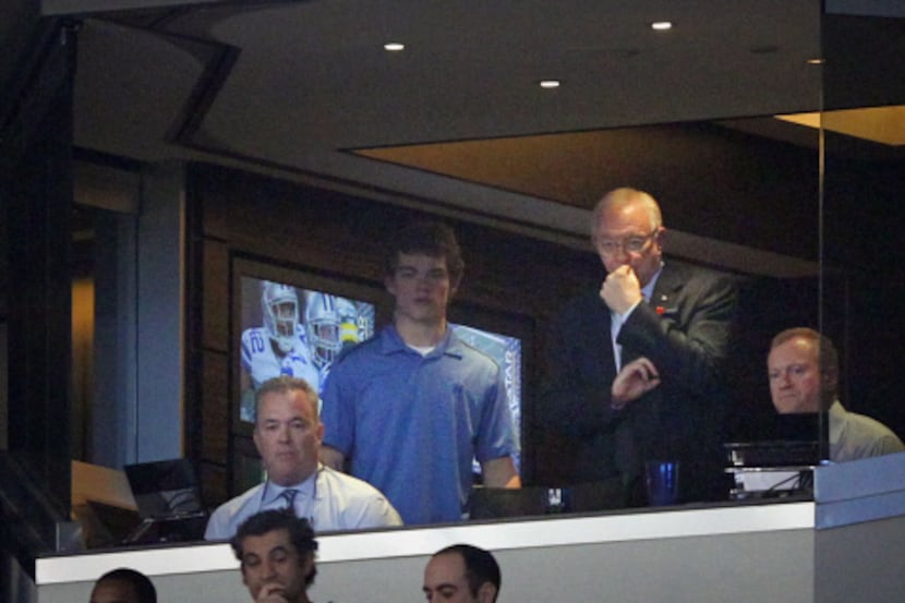 Dallas Cowboys owner Jerry Jones, flanked by his sons, Jerry Jr. (right) and Stephen (left)...