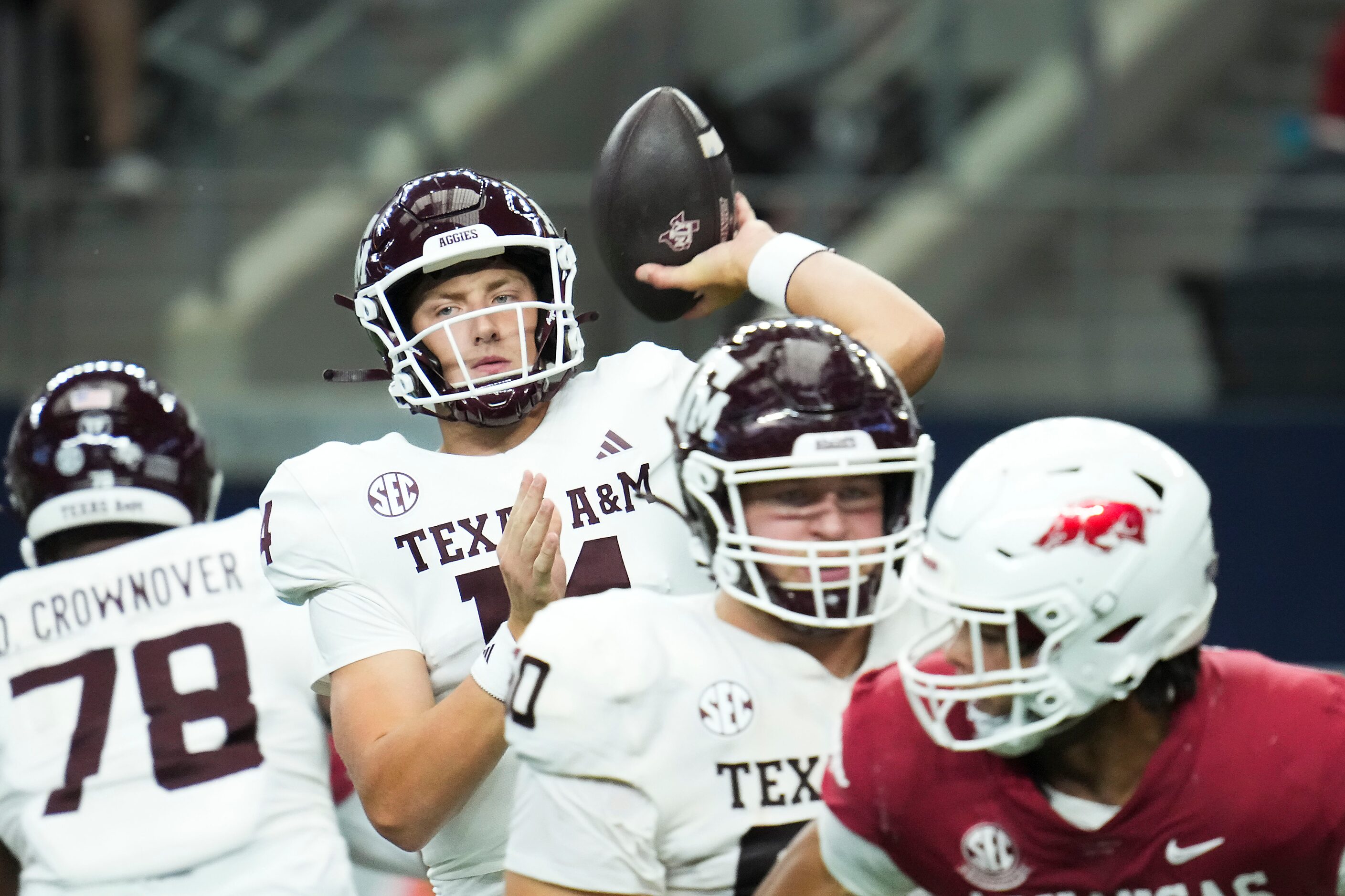 Texas A&M quarterback Max Johnson (14) throws a pass during the first half of an NCAA...