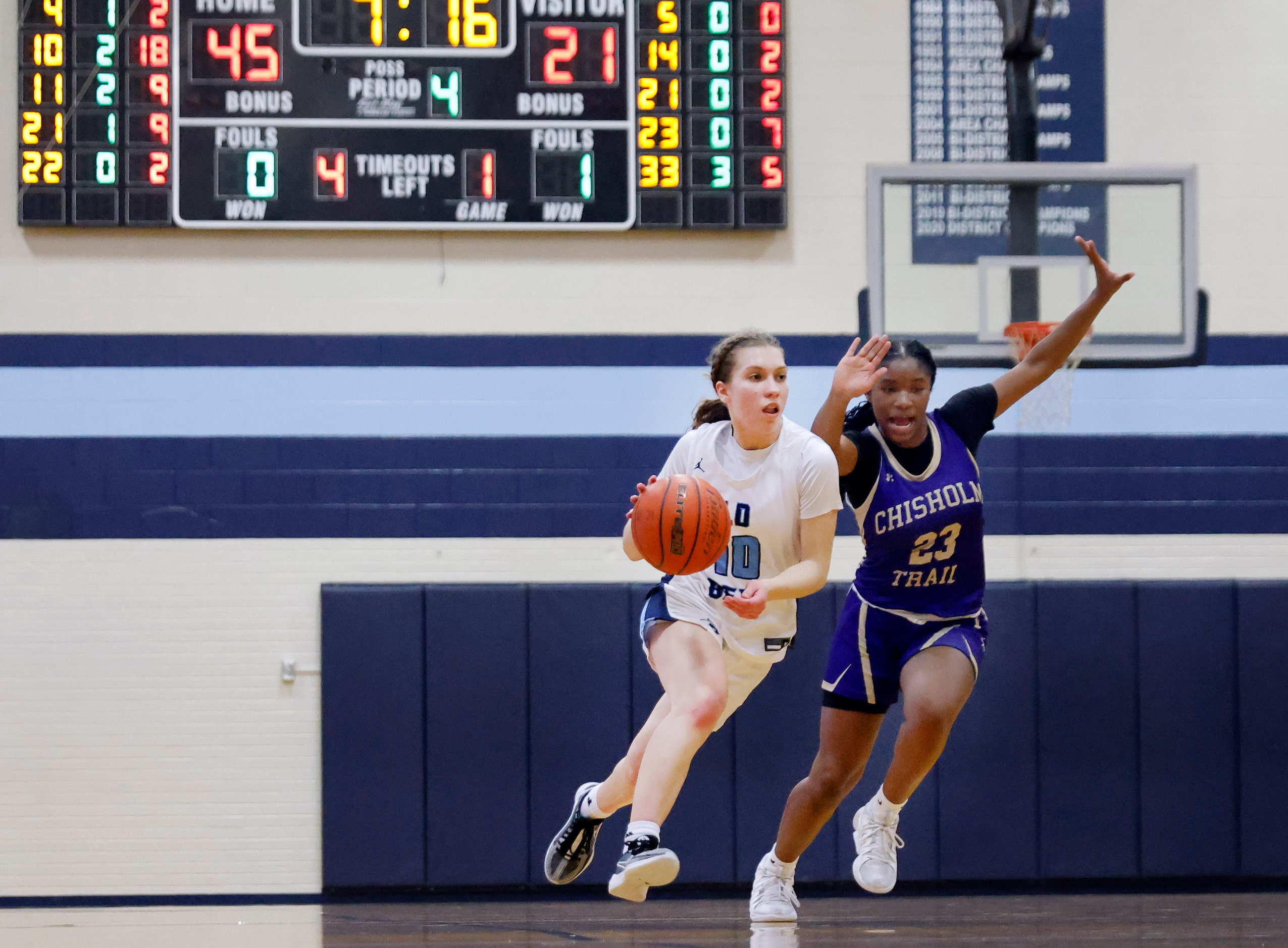 Hurst L.D. Bell’s Katelyn Tietjen (10) brings the ball up court as she is pursued by Saginaw...