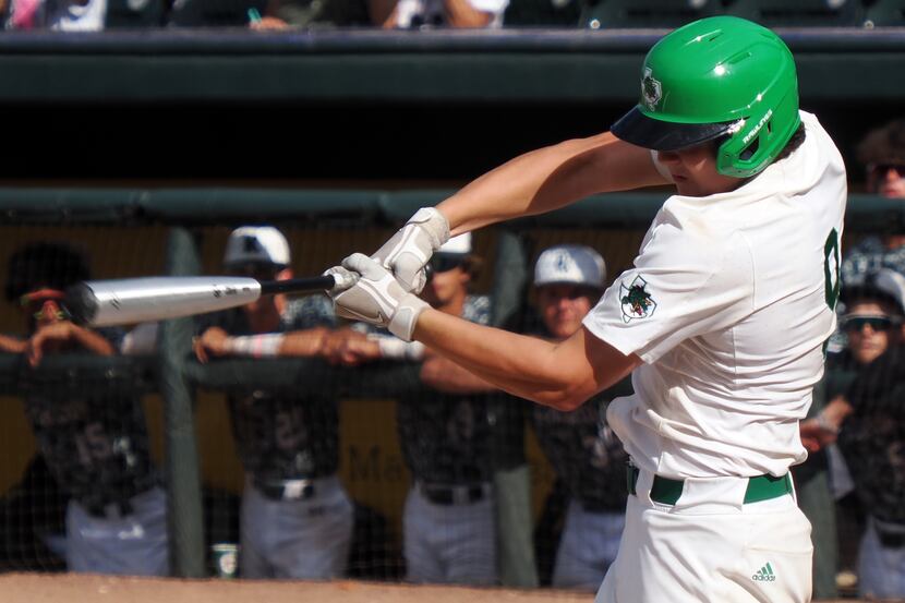 Southlake Carroll batter Owen Proksch (9) hits a 2-RBI single in the bottom of the 4th to...