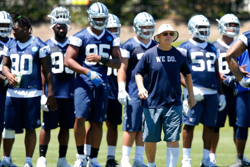 Dallas Cowboys defensive coordinator Rod Marinelli watches his players work during organized...