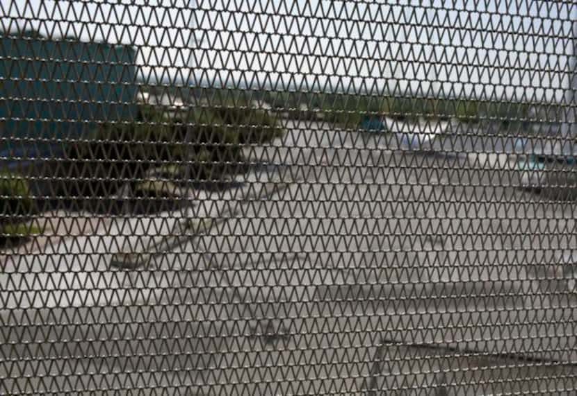 
A detail of the metal veil that James Carpenter gift-wrapped the Cotton Bowl in in Dallas...