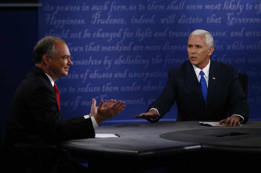 Vice presidential candidates Tim Kaine and Mike Pence debated Tuesday night. (Andrew...