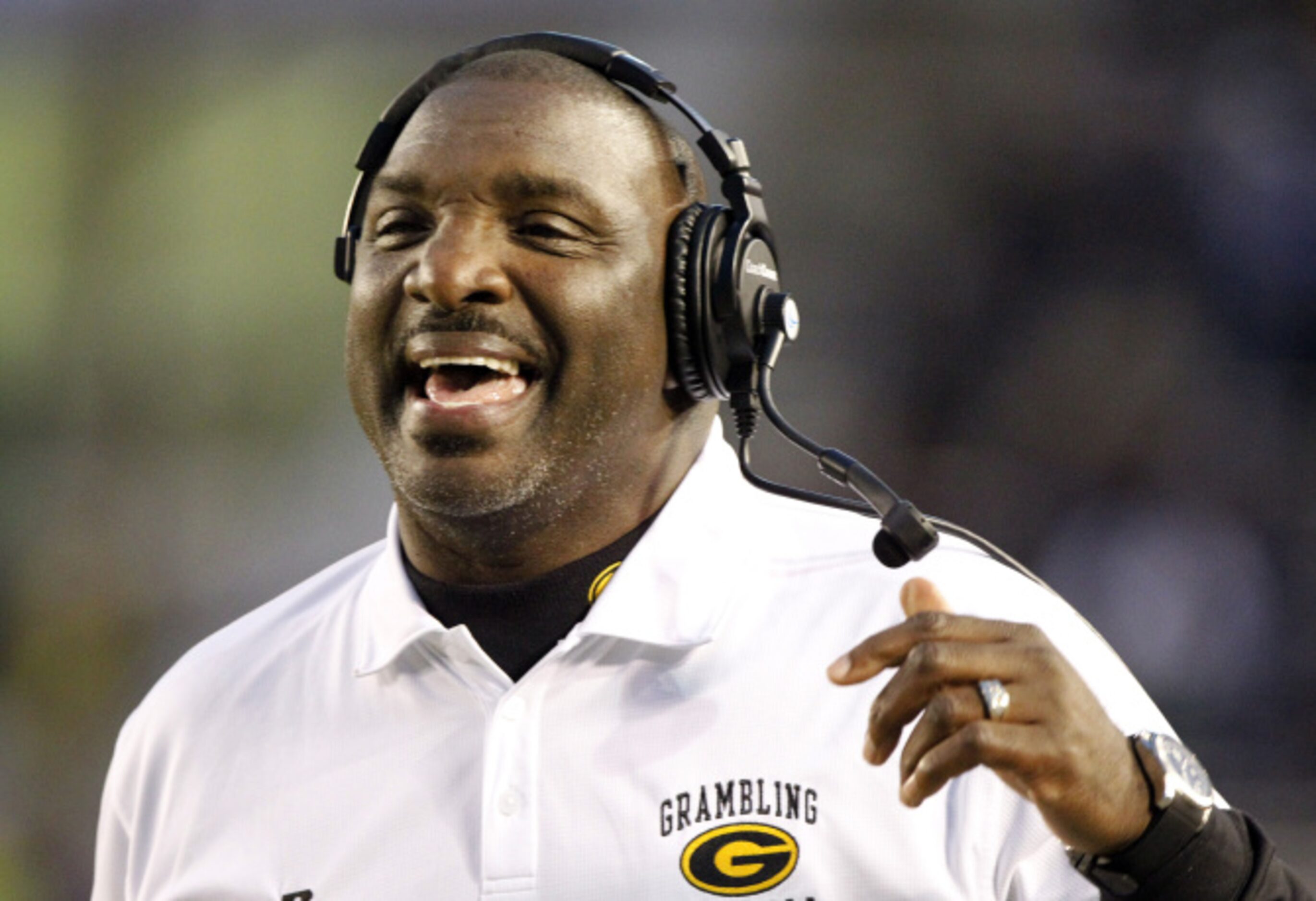 Grambling head coach Doug Williams  reacts to his team's first down during the first half of...