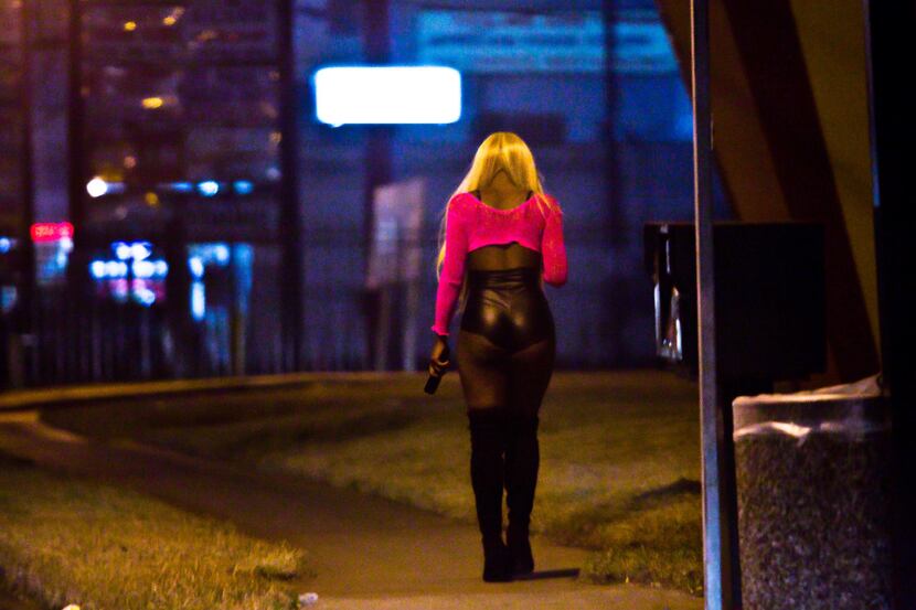 Pimps send their victims to "walk the track" on a stretch of Bissonnet Street in Houston....
