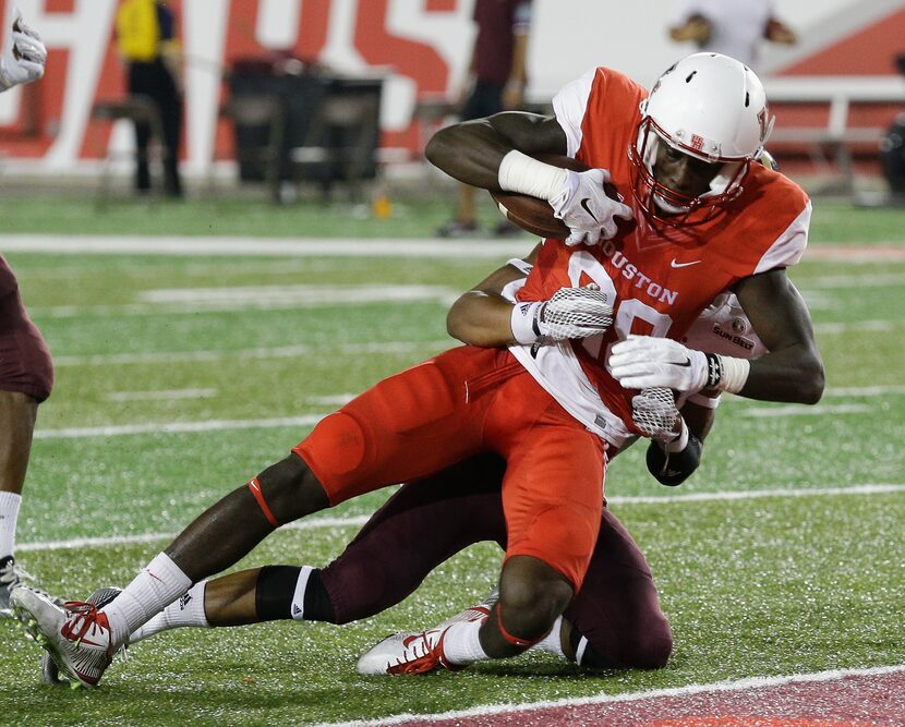 HOUSTON, TX - SEPTEMBER 26:  Steven Dunbar #88 of the Houston Cougars scores on a 65 yard...