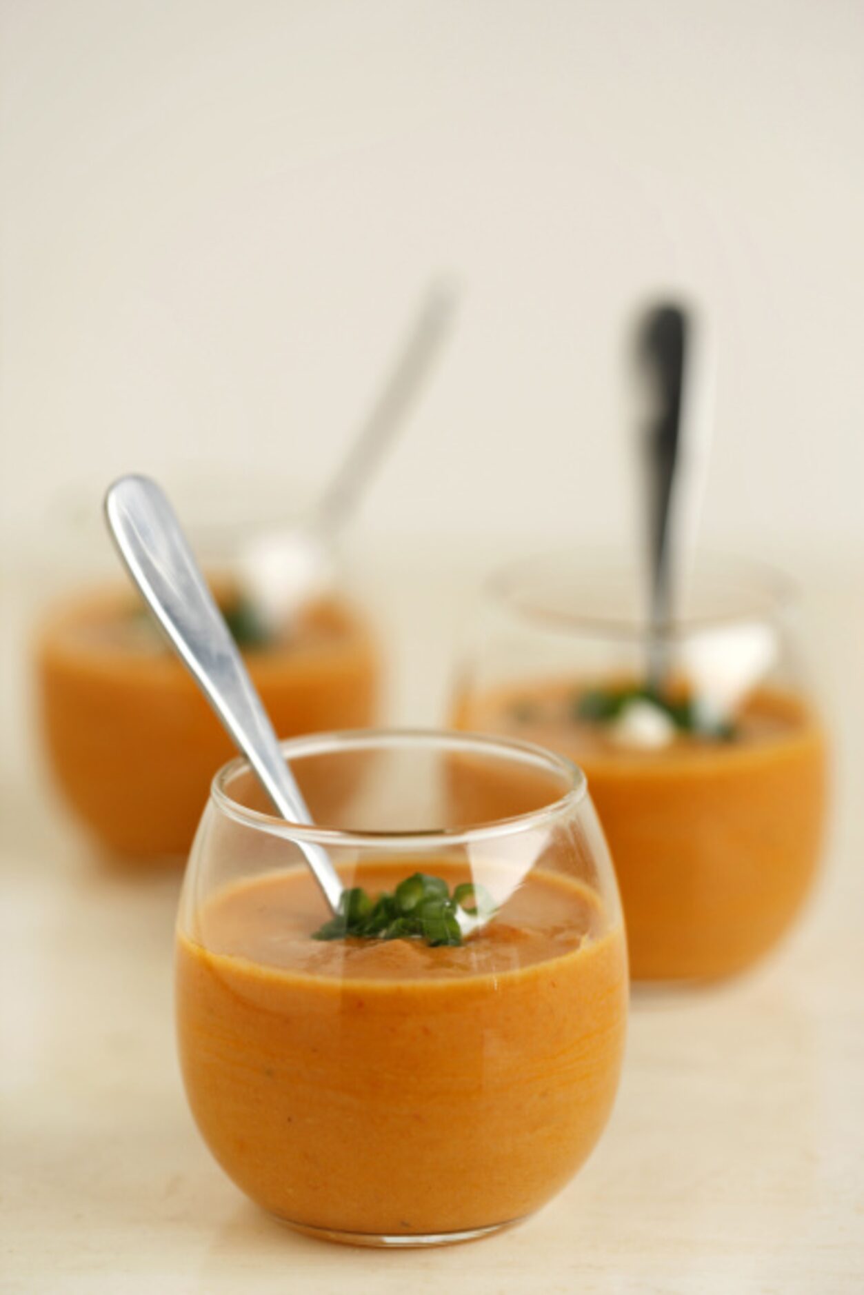 SOUP SHOOTERS: Heat package butternut squash soup. Ladle just under 3 ounces into each small...