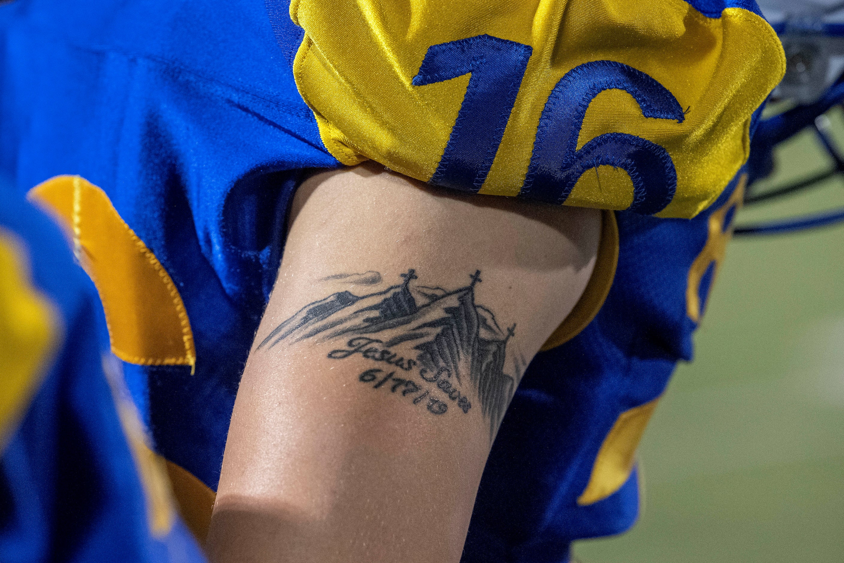 Sunnyvale senior tight end Caden Janicek (16) sports a “Jesus Saves” tattoo during a...