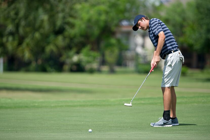 Highland Park's Scottie Scheffler putts at Onion Creek Club Golf Course in Austin on April...