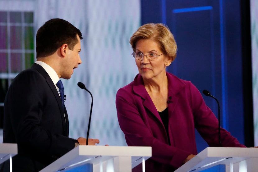 Democratic presidential candidate South Bend, Ind., Mayor Pete Buttigieg speaks with Sen....