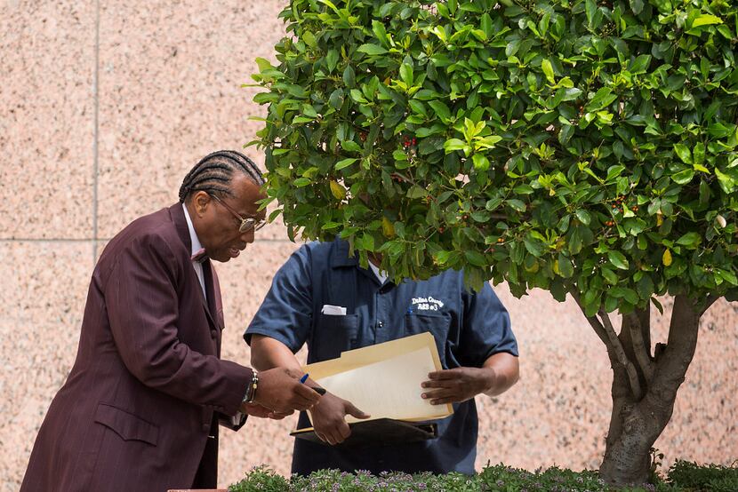 Dallas County Commissioner John Wiley Price steps outside the Earle Cabell Federal Building...