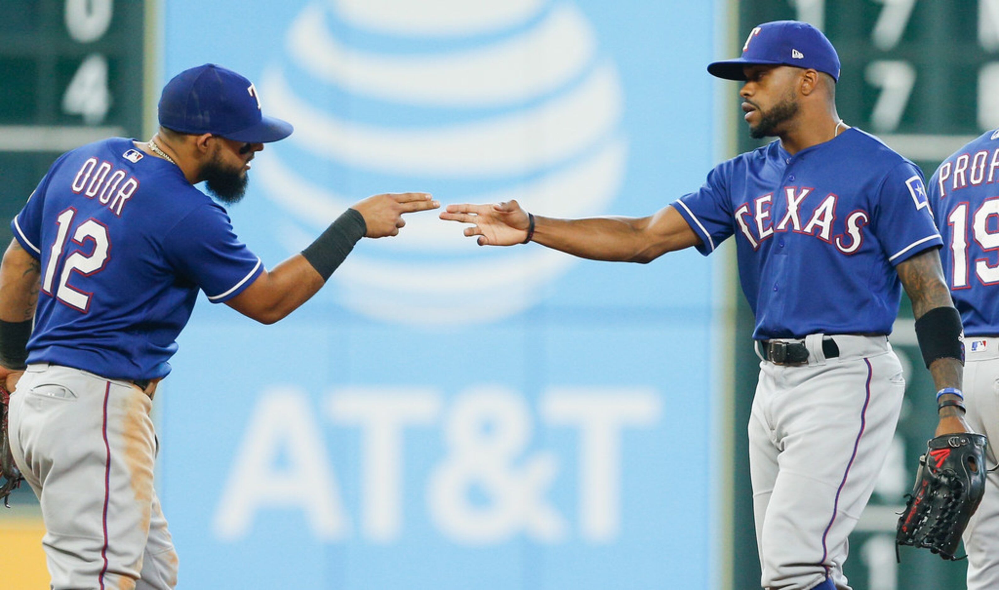 HOUSTON, TX - JULY 29:  Rougned Odor #12 of the Texas Rangers celebrates  with Delino...