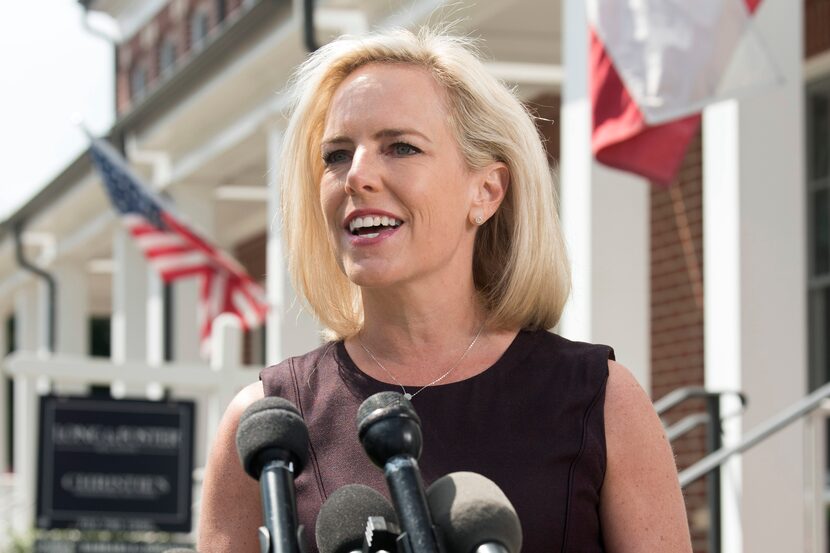 Homeland Security Secretary Kirstjen Nielsen talks outside her home in Alexandria, Va., on...