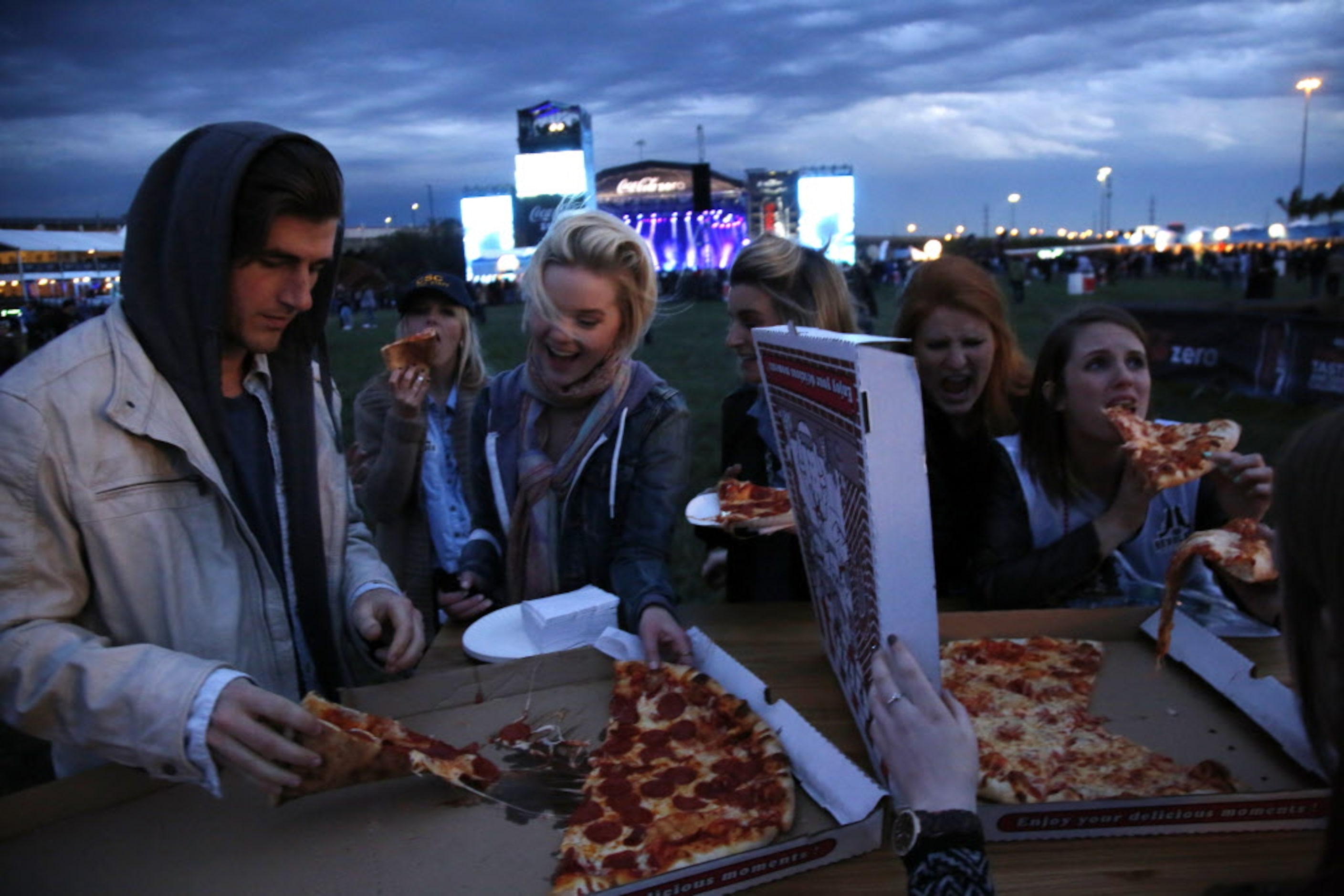 Joey Barnard (l to r), Lauren Lally, Heather Harman and Anna McCord eat pizza during The...